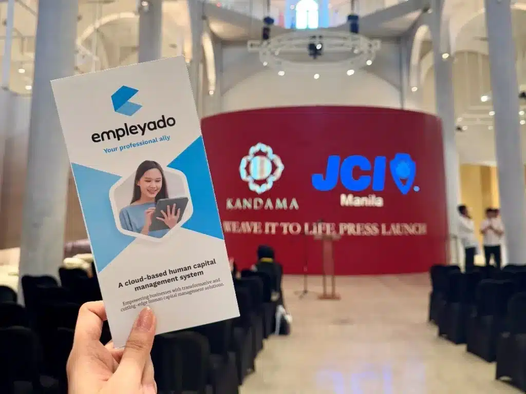 empleyado brochure displayed during a screening event in partnership with Kandama and JCI — showcasing collaboration on workforce empowerment and cultural advocacy.